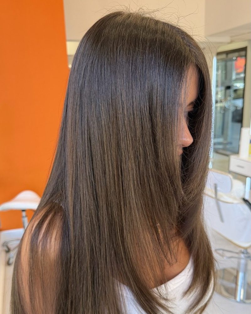 Long, straight, polished brunette